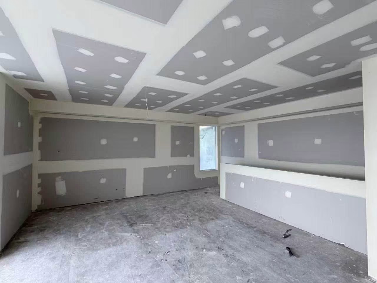 Large plastered room with new ceiling and walls