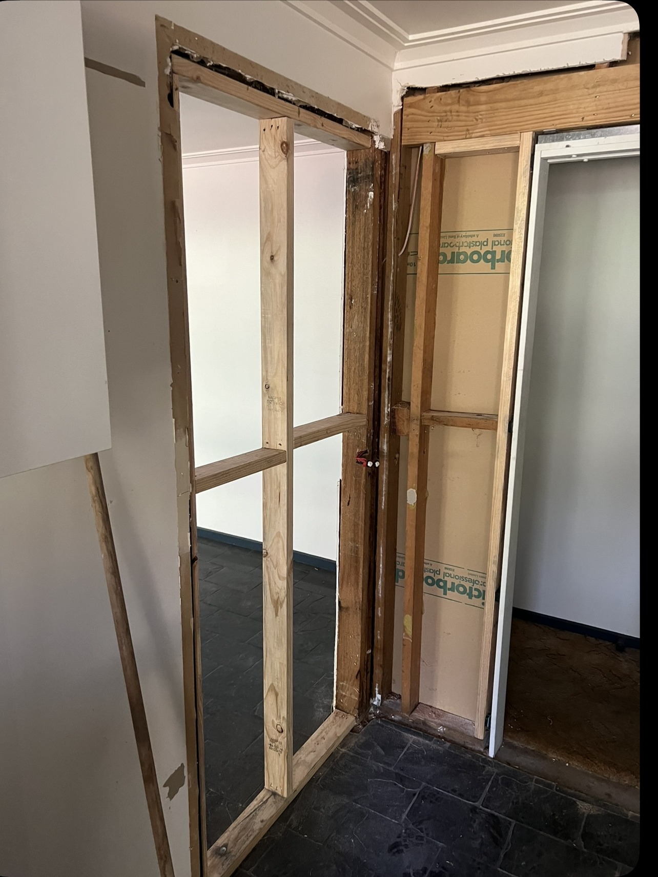 Exposed timber wall framing before plastering